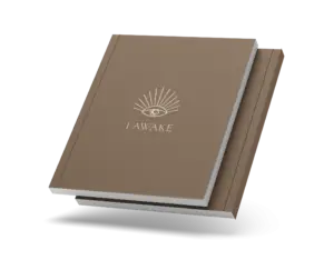 Closed I AWAKE journal with the eye cover and a thin coloured spine, on a transparent background.