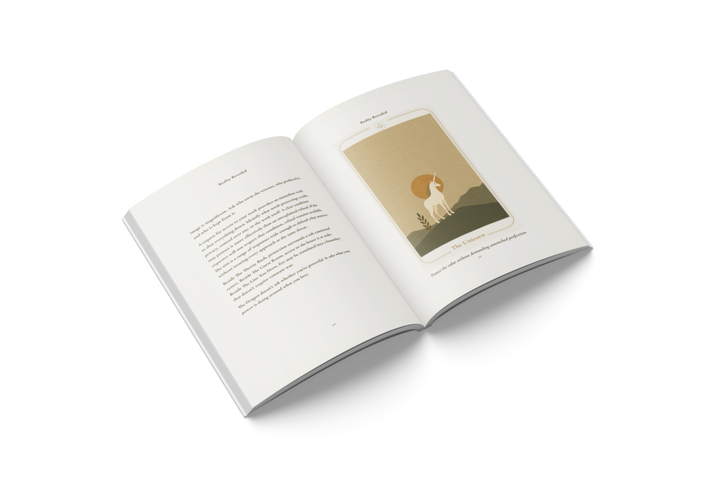 Reality Revealed printed book open to actual pages 346 and 347, text facing the Unicorn illustration